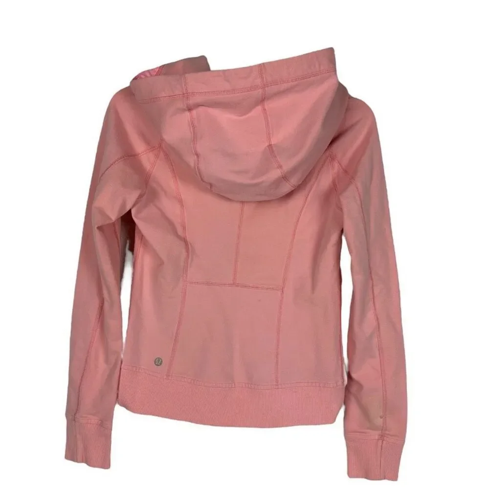 Lululemon Rejuvenate Hoodie size 8 Bleached Coral has a spot